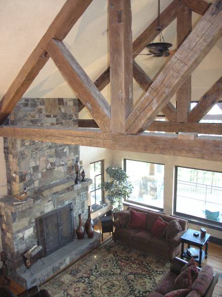 Hand-Hewn Timbers and Trusses / These hand-hewn timbers were stained by the contractor before installation